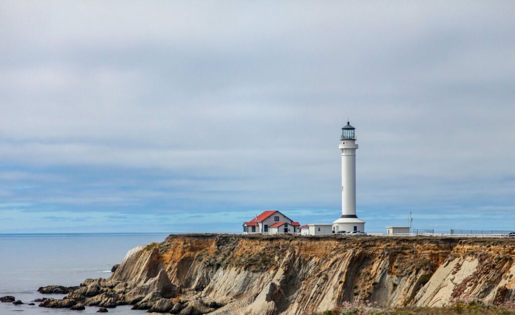 A lighthouse on a cliff.