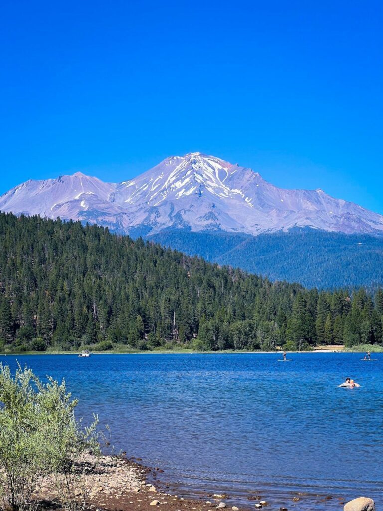 A lake with a mountain in the background.